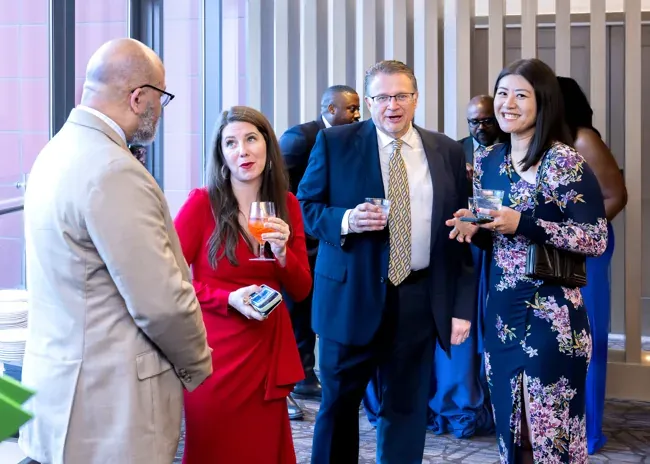 ASE 2026 guests in conversation during the reception