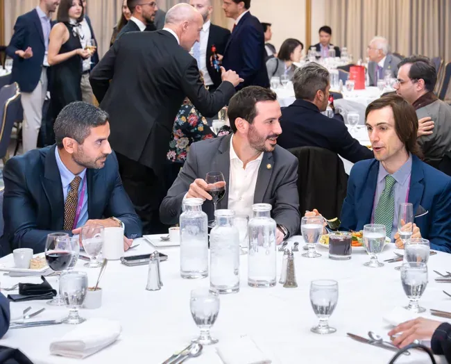 Guests sharing a conversation at a DDW 2026 SSAT Foundation reception table
