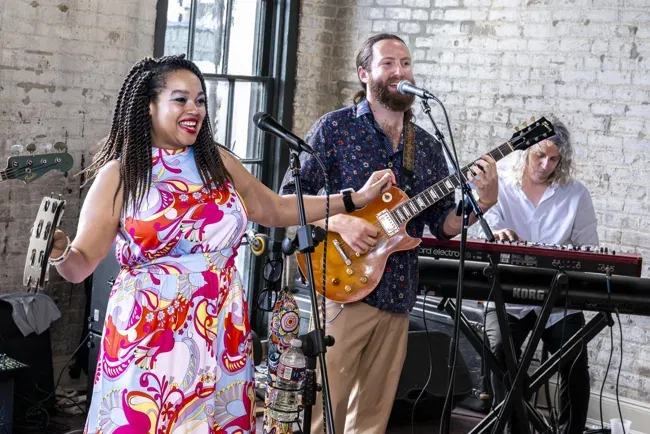 Incentive Marketing Association — Singer and musicians performing live