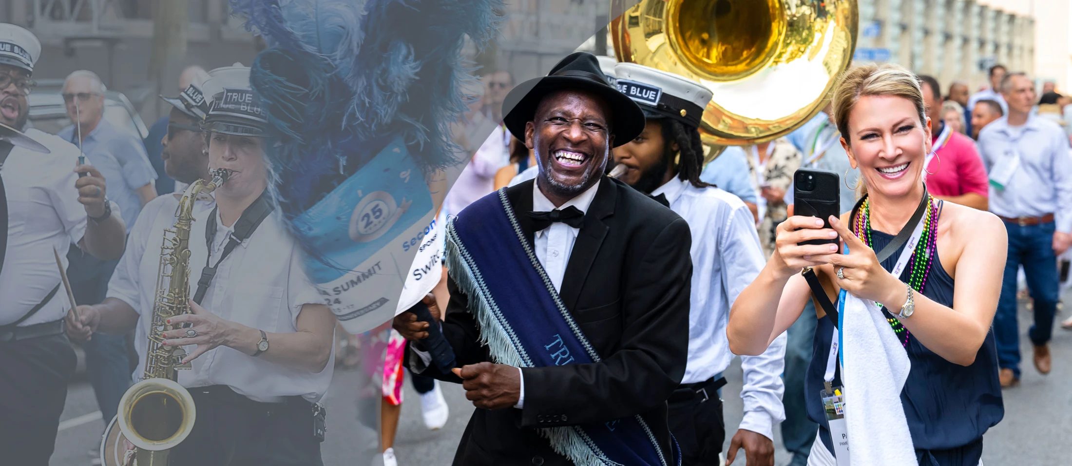 Smiling attendees beside a brass band at an outdoor event