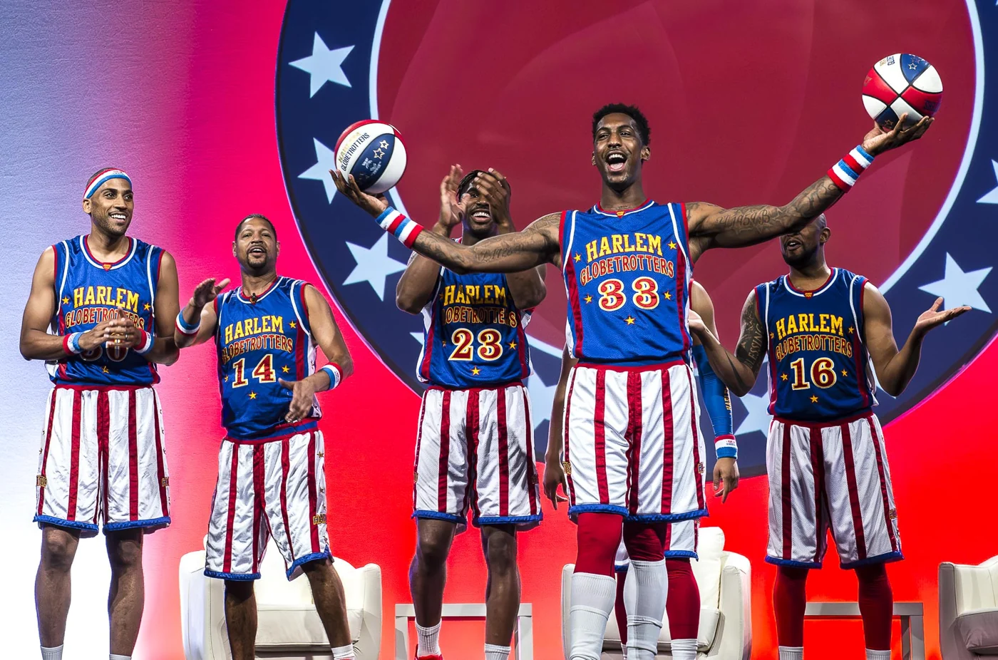 Harlem Globetrotters performing with basketballs at the World Gas Congress