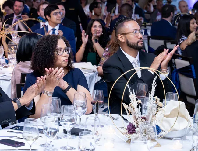 ASE 2026 attendees applauding during the evening program